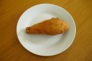 Smažený plněný řízek(prso,sýr,šunka,žampióny,trojobal)
