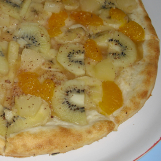 Americká 19. Pizza exotická ovocná (jablkové pyré,kiwi,ananas, mandarinky,banán,ořechy) 30 cm
